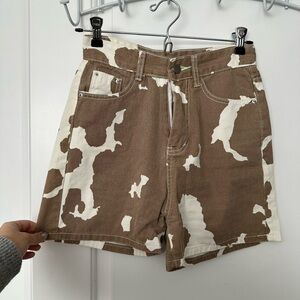12th Tribe cow print shorts
